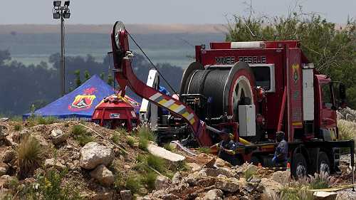 Dozens of survivors and dead pulled from abandoned South African mine